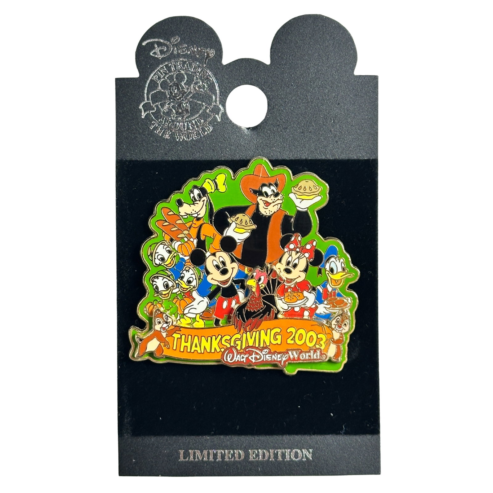 Disney WDW Mickey & Friends Thanksgiving 2003 Pin: Disney WDW Mickey & Friends Thanksgiving 2003 Pin. The whole gang gets together to celebrate a successful Turkey Hunt, especially the turkey who was invited as a guest, not the main course! Characters