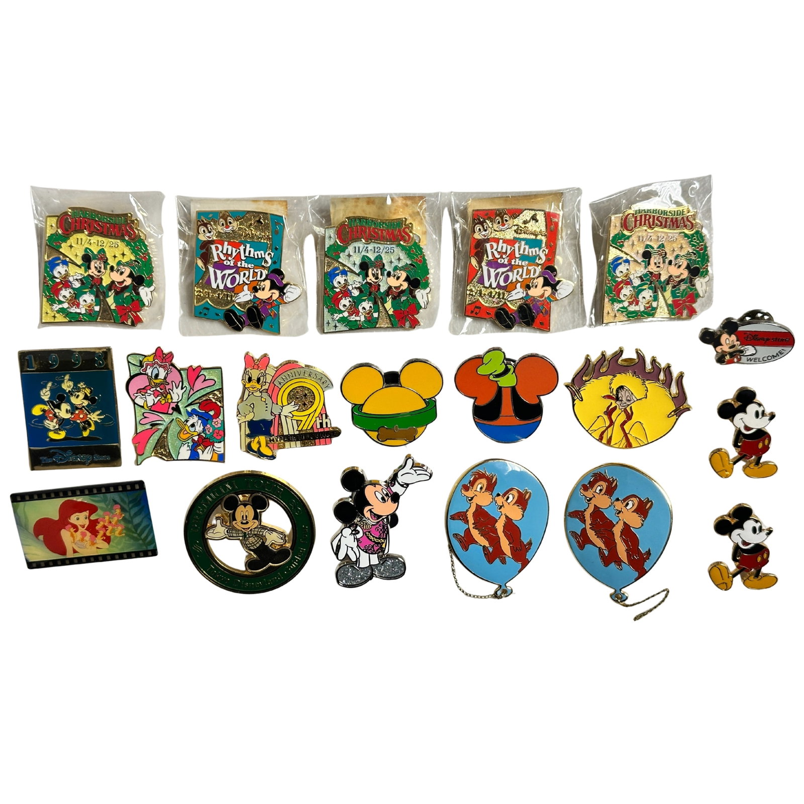 Disney TDR Mickey & Friends Assorted Pin Lot Of 19: Disney TDR Mickey & Friends Assorted Pin Lot Of 19. These pins feature an array of characters and occasions including Mickey, Daisy, Rhythms Of The World, Christmas, and More. *****FREE SHIPPING******