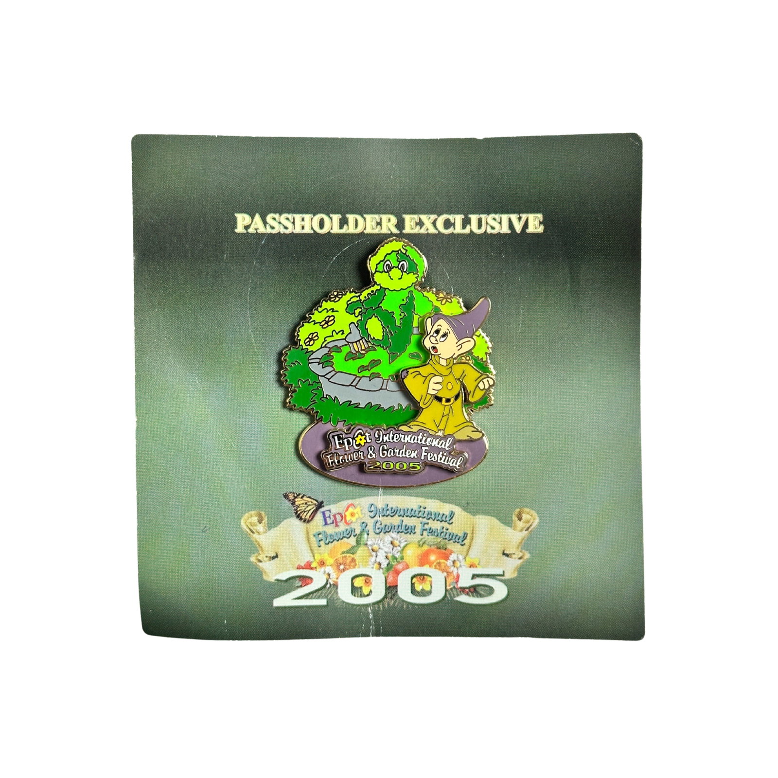 Disney WDW Epcot International Flower & Garden Festival Dopey Passholder Exclusive Pin: Disney WDW Epcot International Flower & Garden Festival Dopey Passholder Exclusive Pin. The pin features Dopey (from Snow White and the Seven Dwarfs) acting quite surprised after he sees a Disney topi