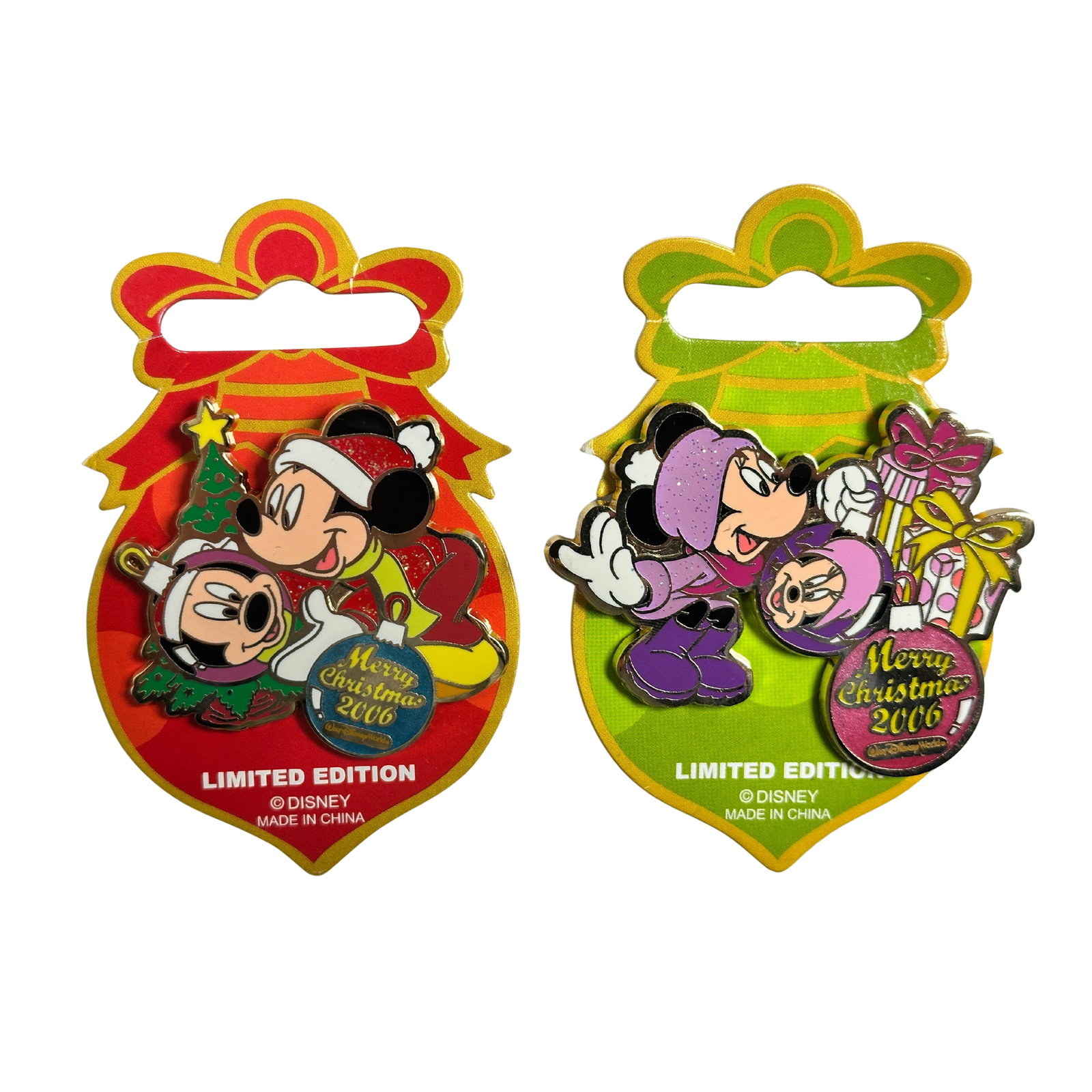 Disney WDW Merry Christmas 2006 Mickey & Minnie Pin Lot Of 2: Disney WDW Merry Christmas 2006 Mickey & Minnie Pin Lot Of 2. These pins celebrate the holidays. The first pin features Mickey dressed for winter next to a decorated Christmas Tree, he is holding an o