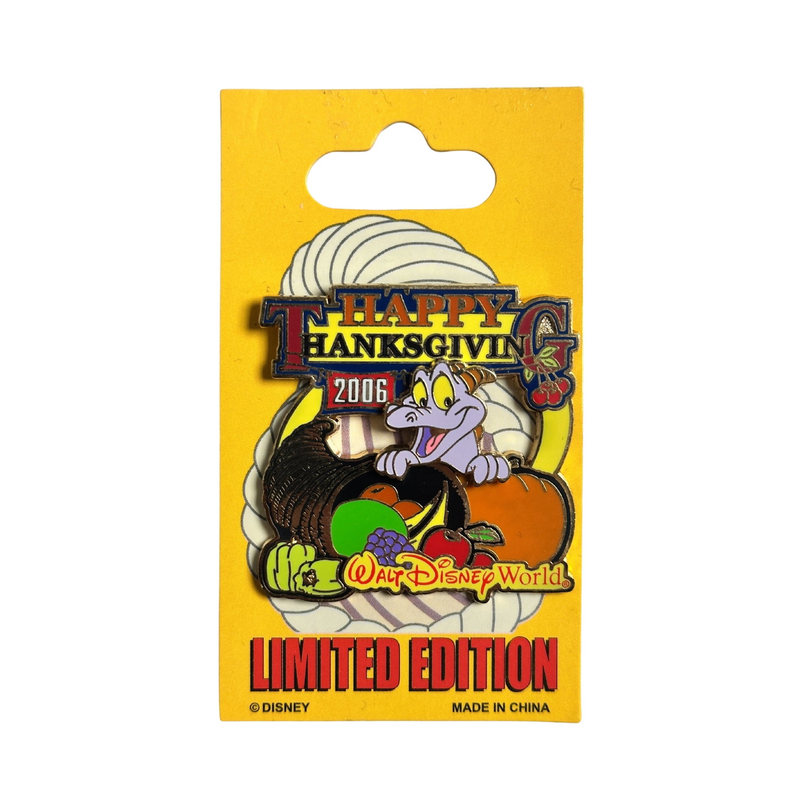 Disney WDW Happy Thanksgiving 2006 Figment Pin: Disney WDW Happy Thanksgiving 2006 Figment Pin. Figment peaks out from behind a cornucopia in this Walt Disney World® Resort Limited Edition pin. This pin is part of the Happy Thanksgiving 2006 Colle