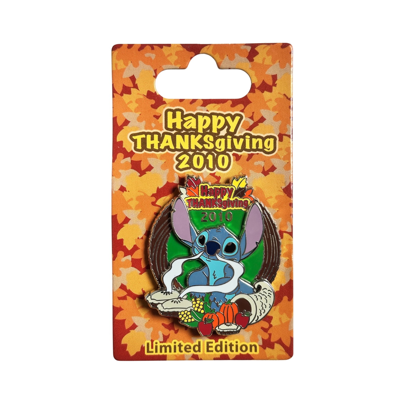 Disney WDW Happy Thanksgiving 2010 Stitch Pin: Disney WDW Happy Thanksgiving 2010 Stitch Pin. Stitch celebrates a Happy Thanksgiving 2010 in this limited edition pin. Stitch is smelling the pies. Next to him is a cornucopia with apples, pumpkins, 