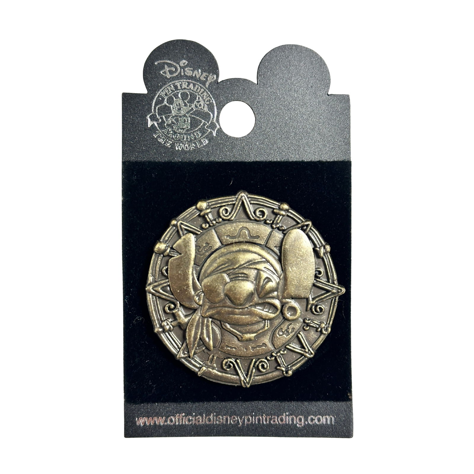 Disney WDW Pirates of the Caribbean Stitch Coin Pin: Disney WDW Pirates of the Caribbean Stitch Coin Pin. This pin features Pirate Stitch in the center of a sculpted-relief coin (medallion). Stitch appears to be angry. He is wearing an earring in his le
