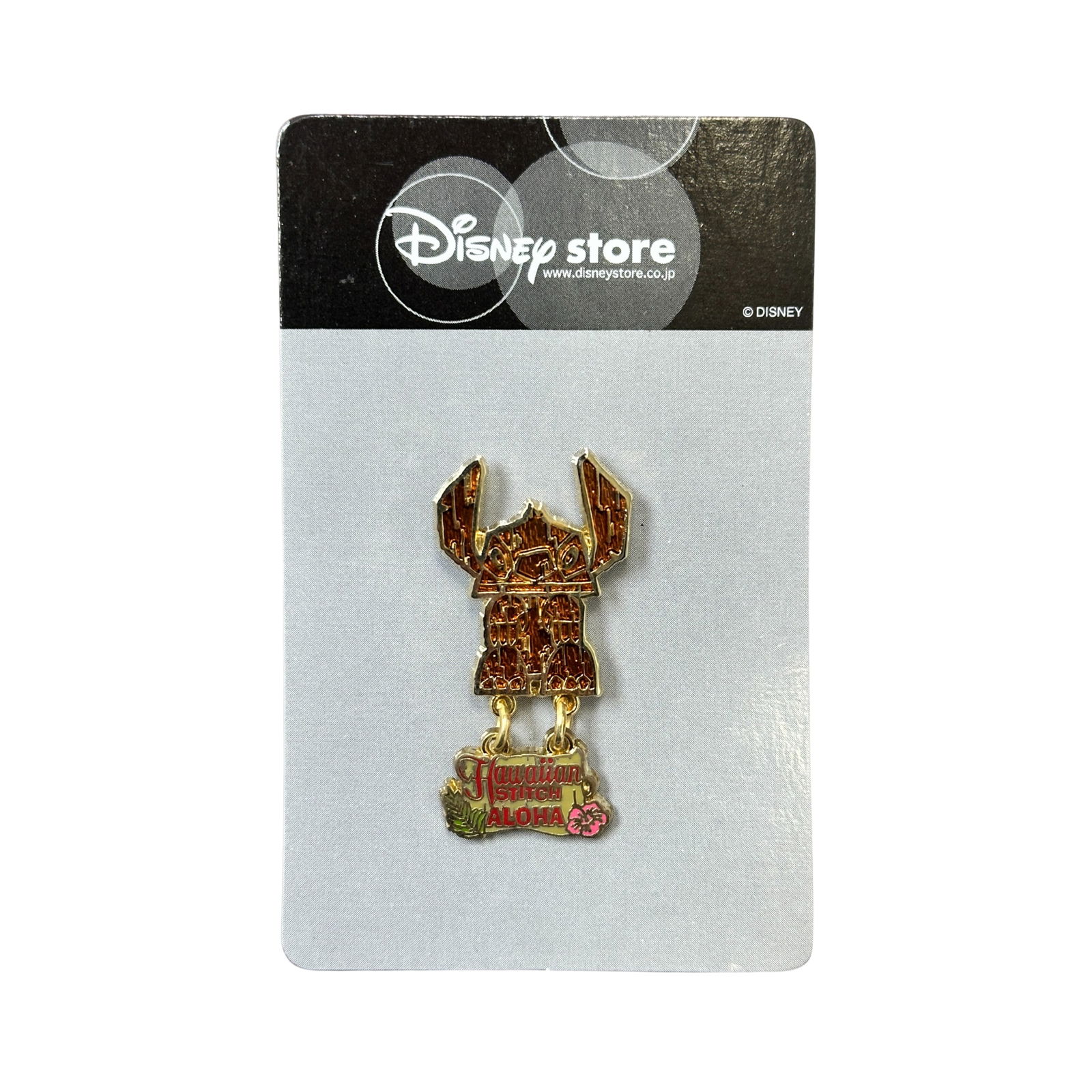 Disney JDS Aloha Tiki Hawaiin Stitch Pin: Disney JDS Aloha Tiki Hawaiin Stitch Pin. Reddish/Brown Stitch tiki with a dangle below that reads "Hawaiian Stitch Aloha". Enamel cloisonné.*****FREE SHIPPING********SELECT BUYER ARRANGED SHIPPING A