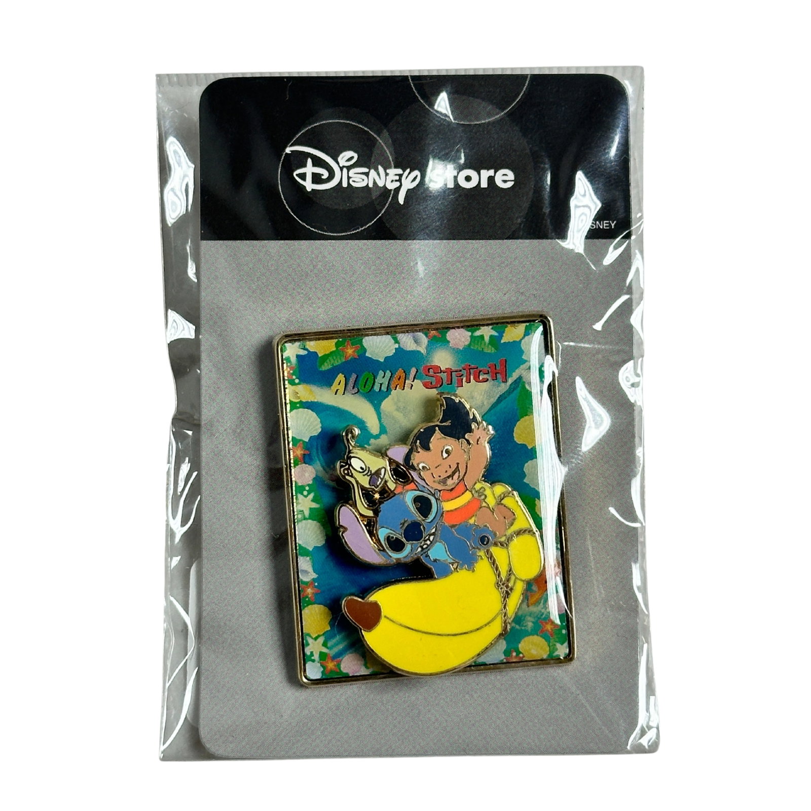 Disney JDS Aloha Stitch Banana Boat Pin: Disney JDS Aloha Stitch Banana Boat Pin. his pin is from the Japan DS (JDS). It is a two-piece pin attached with a spring. The top pin is cloisonne' with Lilo, Stitch, and Pleakley on a Banana Boat. T