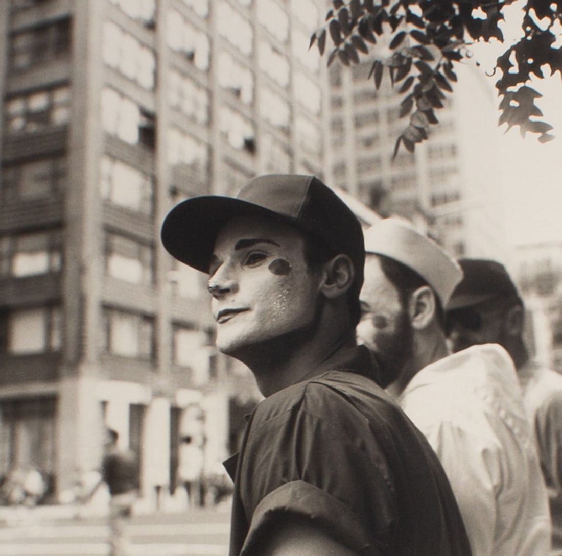 Bruce Cratsley 1983 "3 Faces Gay Parade" Photograph: 1983 black and white photograph titled 3 Faces, Gay Parade by Bruce Cratsley (1944-1998). Signed, dated, and titled to verso. Photo mounted on heavy paper.Measurements: 14" W