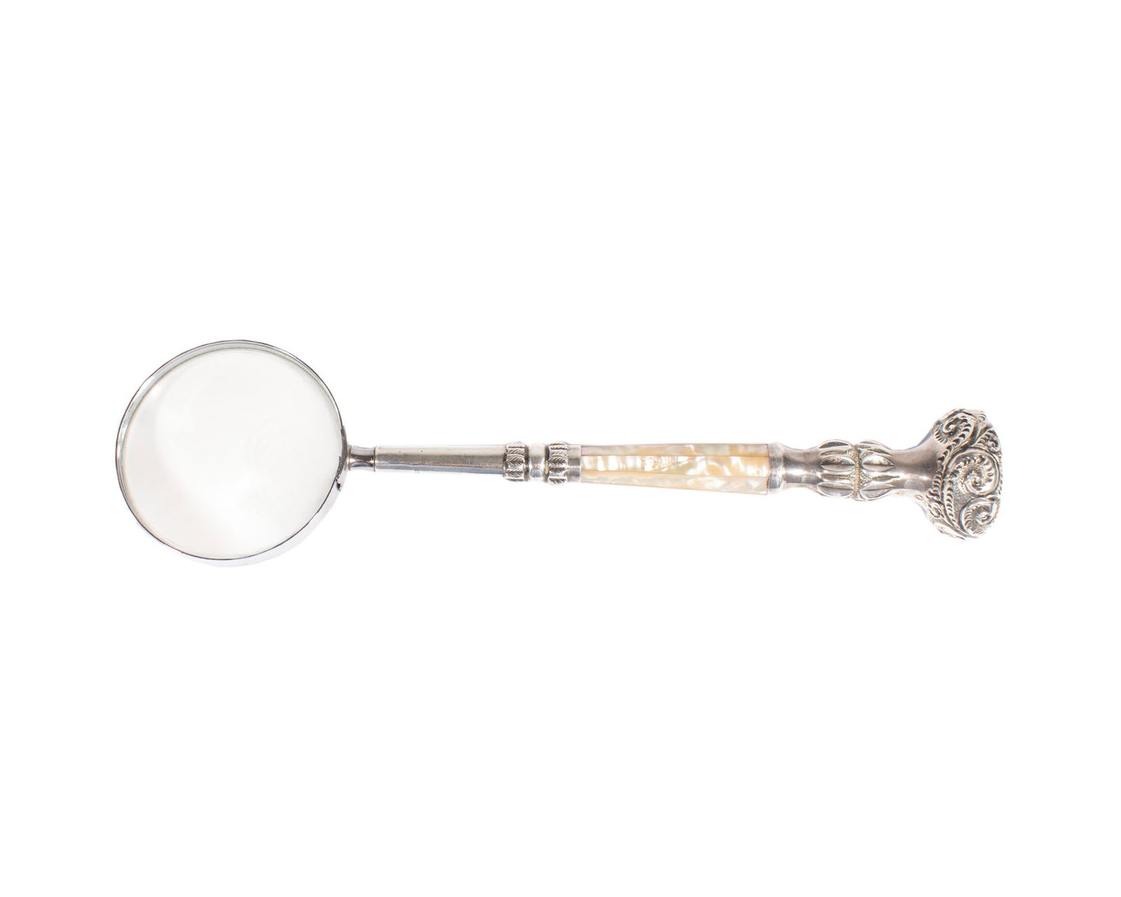 Sterling Silver and Shell Handle Magnifying Glass: Magnifying glass with sterling silver and shell handle. Handle marked "Sterling" in two places. End of handle is monogrammed "P.P.B." Measurements: 11.75" W x 1.75" H x 3