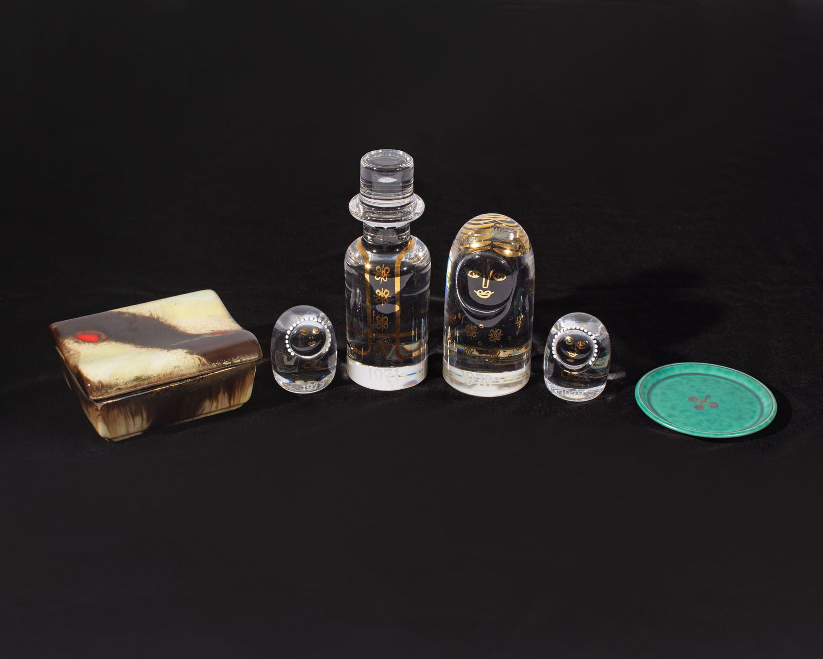 Gustavsberg, West German, Kosta Boda Familjen Mid-Century Decor: Group of mid-20th century decor items. Included is a ceramic West German box, a Gustavsberg Argenta small dish or coaster with spade designed by Wilhelm Kage, and a set of four glass Familje