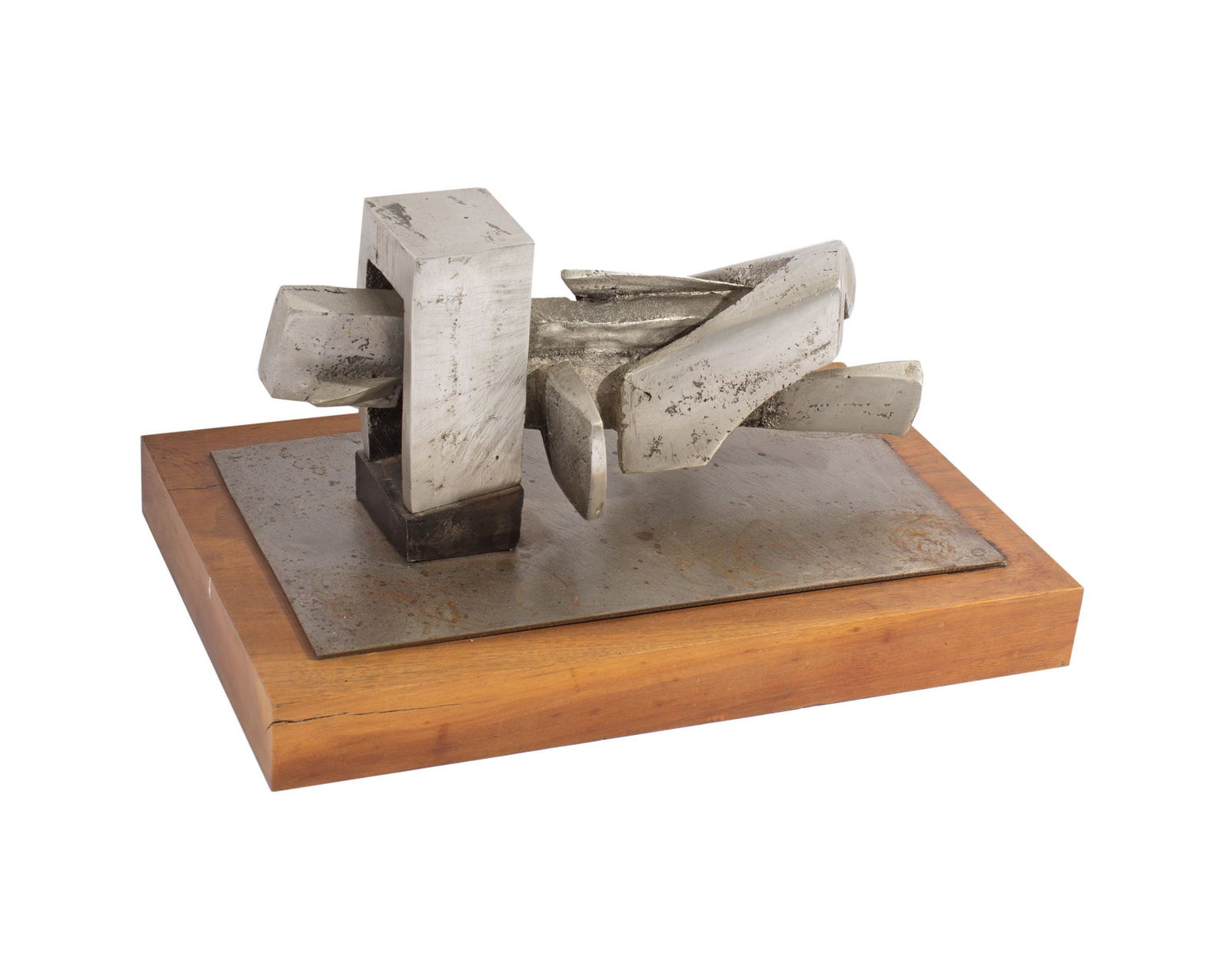 Utiger 1971 Abstract Metal Sculpture: 1971 abstract metal sculpture mounted on a wooden base. Signed "UTIGER/71." Measurements: 17” W x 8.5” H x 11” D. In house shipping available.