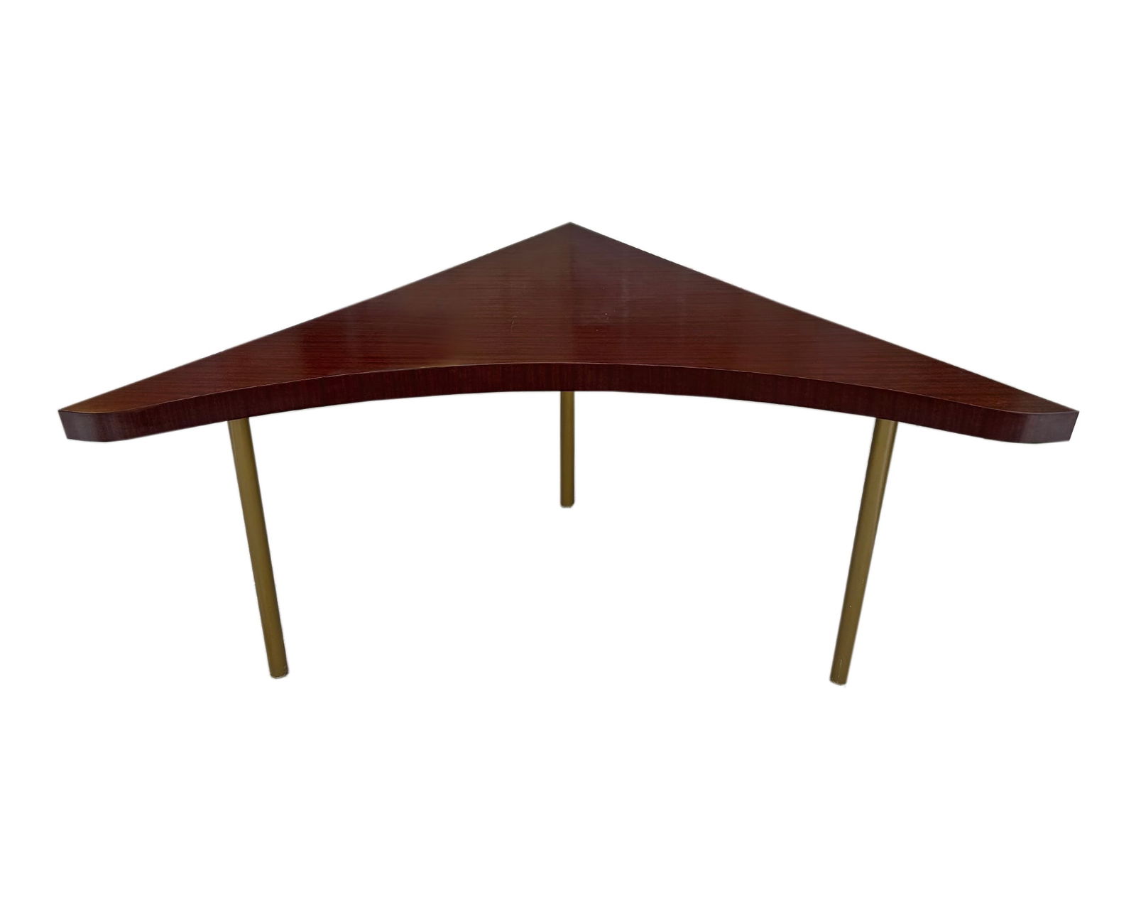 Mid-Century Corner Table: Mid-20th century American corner table. Table has slightly curved edge, stands on three brass cylindrical legs. Measurements: 54.5" W x 25" H x 30" D. P