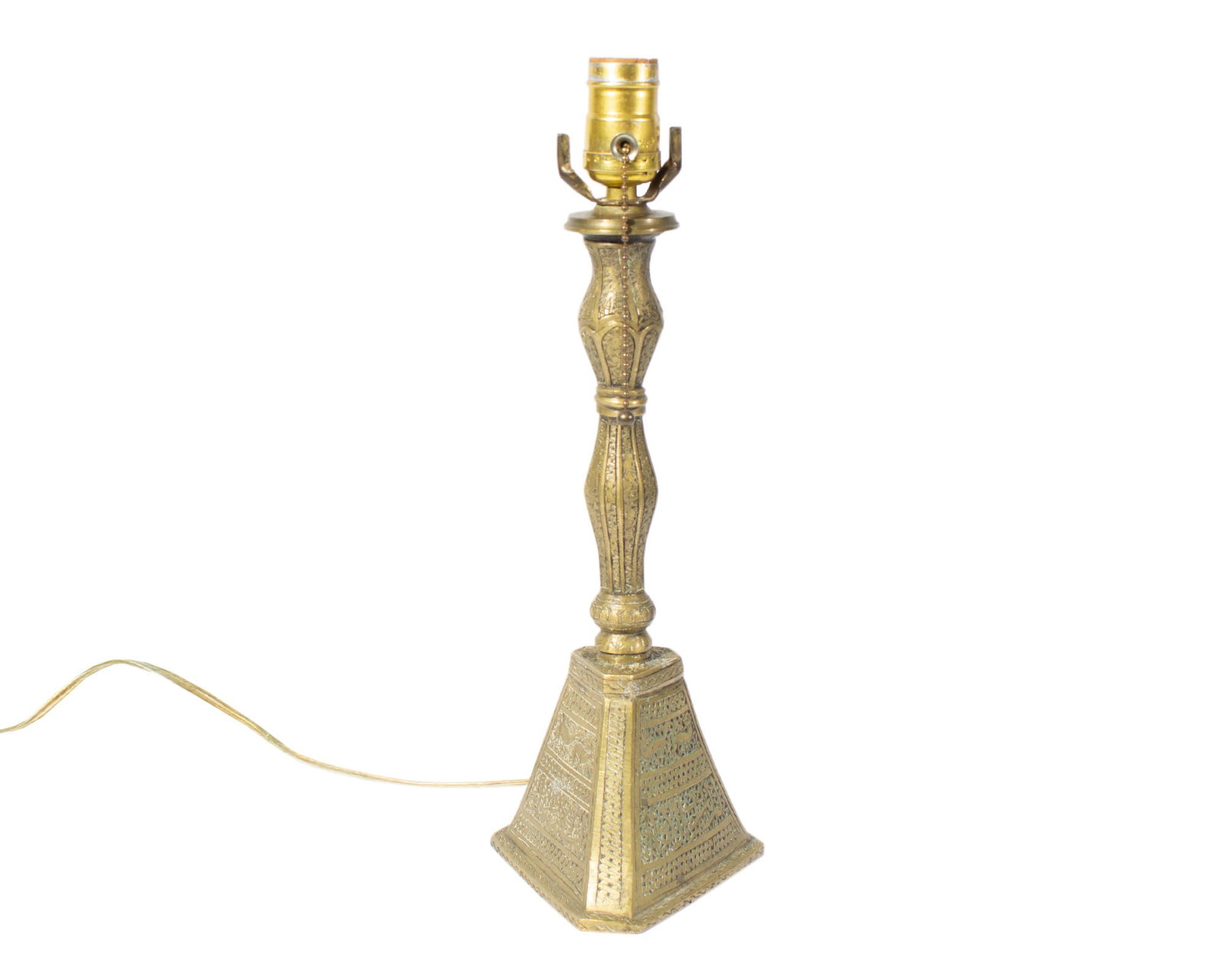 Persian Engraved Brass Candlestick Table Lamp: Persian brass candlestick holder that has been converted into a table lamp. Lamp has engraved calligraphic designs as well as animal motifs. Measurements: 5" W x 5" D x 15.25&qu