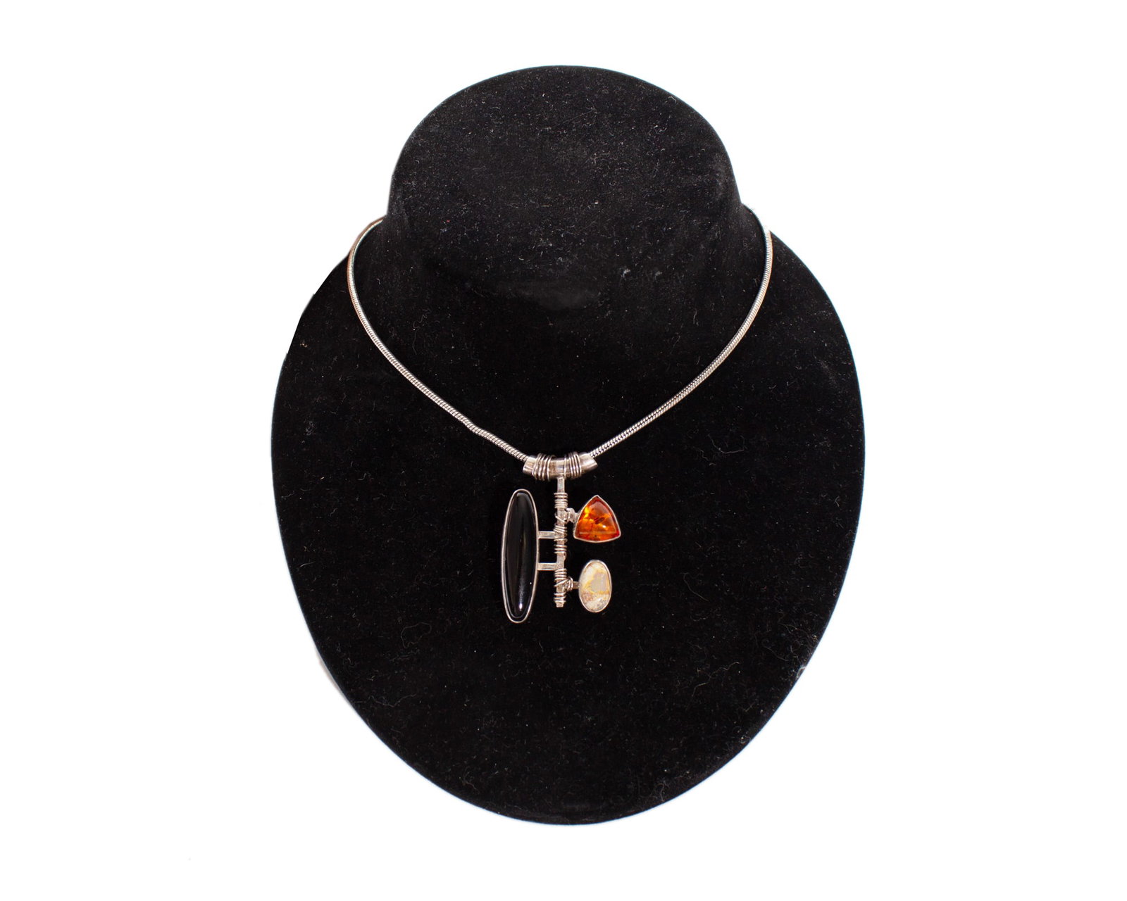 Silver Artisan Pendant: Silver artisan made pendant. Unmarked. Pendant tested as silver. Measurements: 1" W x 1.5" H (pendant). In house shipping available.