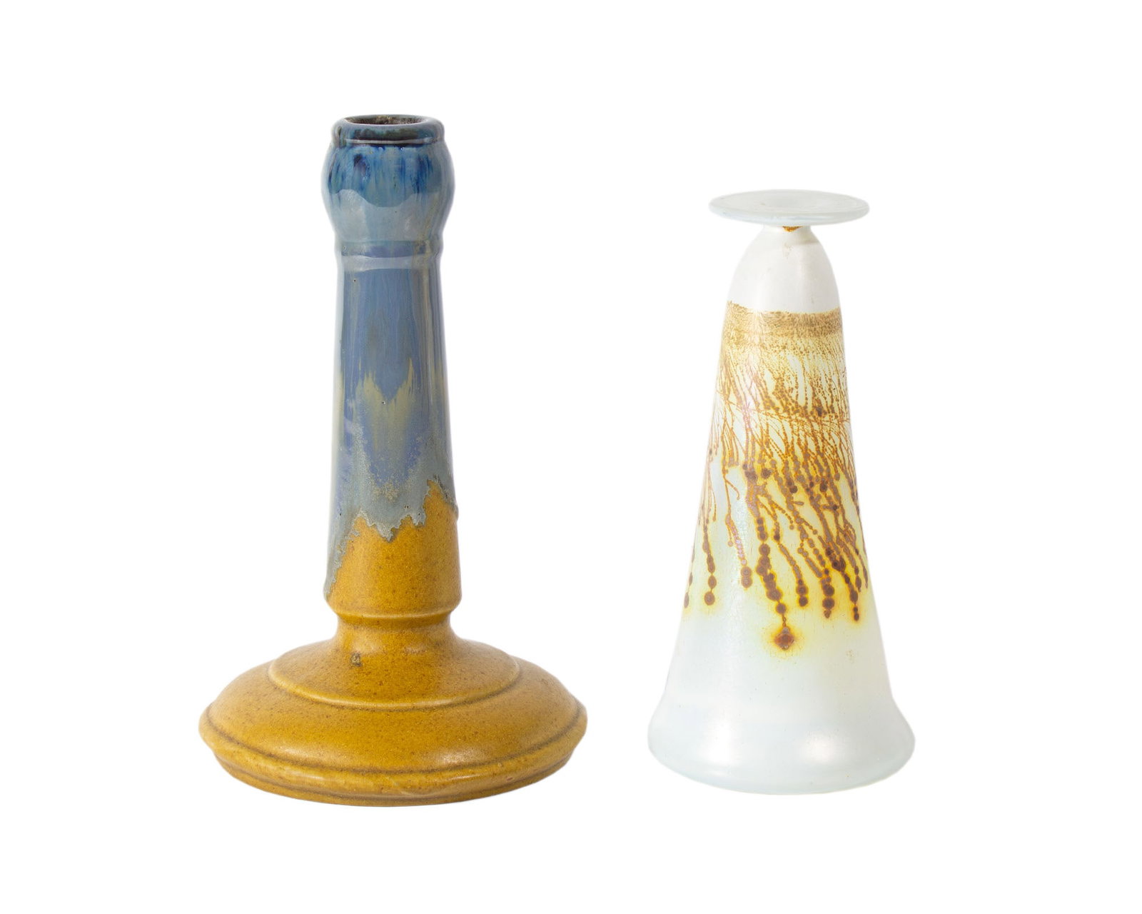 Fulper Pottery Candlestick Holder and Art Glass Vase: Fulper Pottery candlestick holder and an art glass vase. Candlestick holder marked to underside, vase is unmarked. Measurements: 5.25" W x 8.75" H. 5.25" D (candlestick holder).