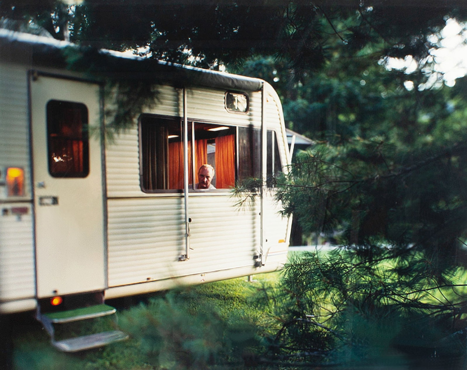 Angela West Signed 1999 "Doghouse" Photograph: 1999 chromogenic dye coupler print after a photograph by artist Angela West (American; b. 1971). Titled Doghouse, from her Father series. Hand-signed by West and