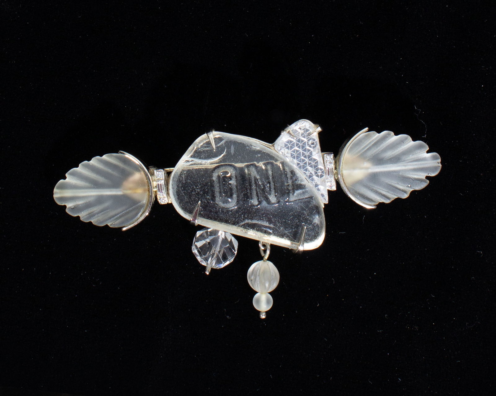 Nancy Lee Worden 14K Found Object Brooch: 14K gold brooch with found objects by jewelry artist Nancy Lee Worden (American; 1954-2021). Marked "Worden" and "14K" to back. Measurements: 3.25" W x 1.5" H.