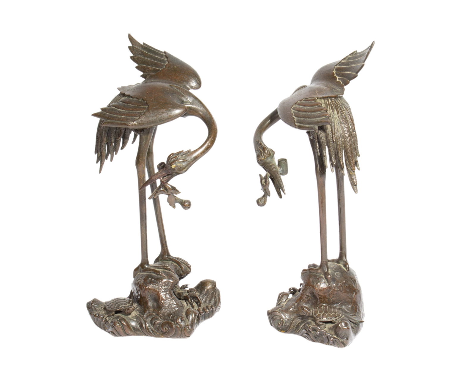 Japanese Bronze Cranes: Pair of Japanese bronze cranes, possibly designed to hold a hanging incense burner. Unmarked. Measurements: 6" W x 12.5" H x 5.5" D (single crane, both measure the same).