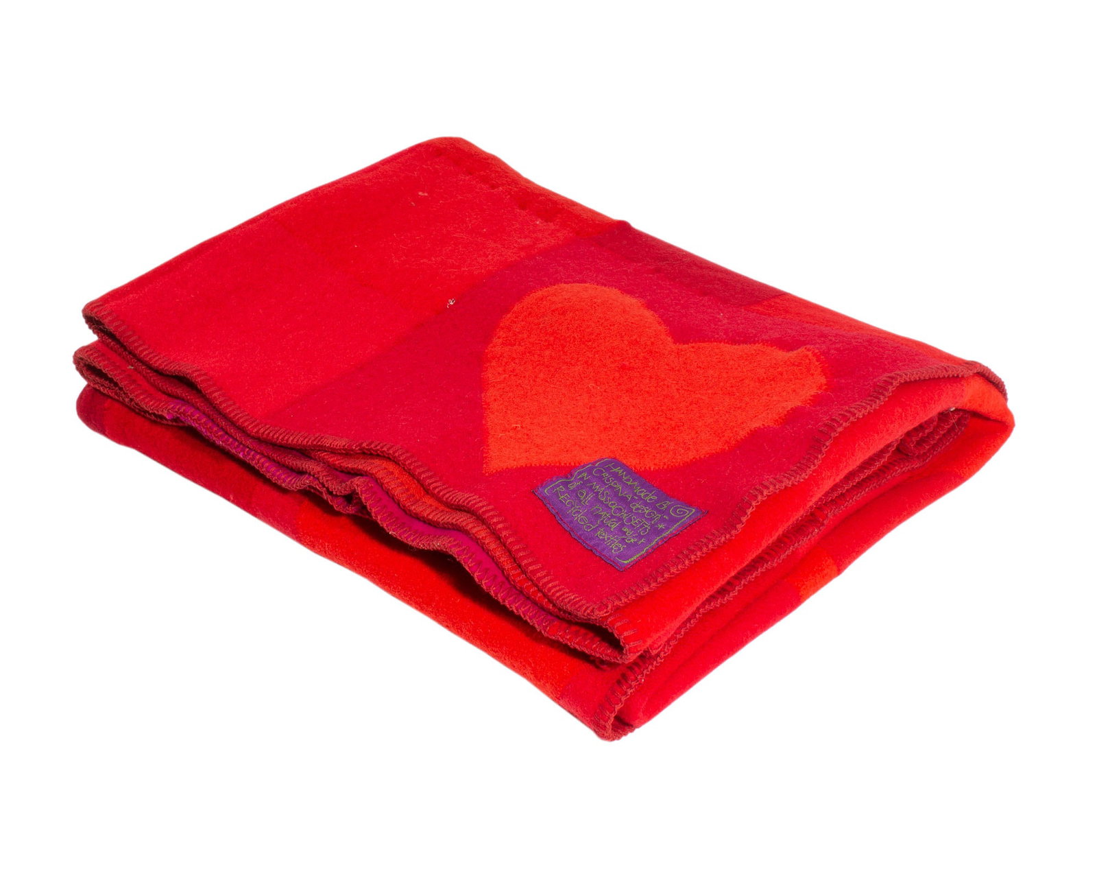Crispina ffrench Crispina Designs Upcycled Heart Blanket: Upcycled patchwork blanket with heart designs by Crispina ffrench. Crispina Designs tag attached to underside of blanket. Measurements: 59" W x 61" D. In house shipping