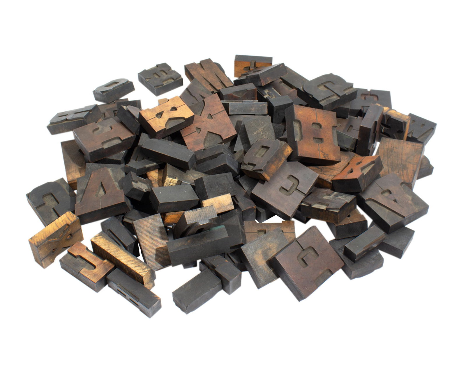 Group of 19th C. Wooden Printers Type Blocks: Group of 19th century wooden printers type blocks. Various sizes and fonts. Approximately 100 blocks in the collection. Measurements: 3.5" L x 4.5" W x 1.25" D