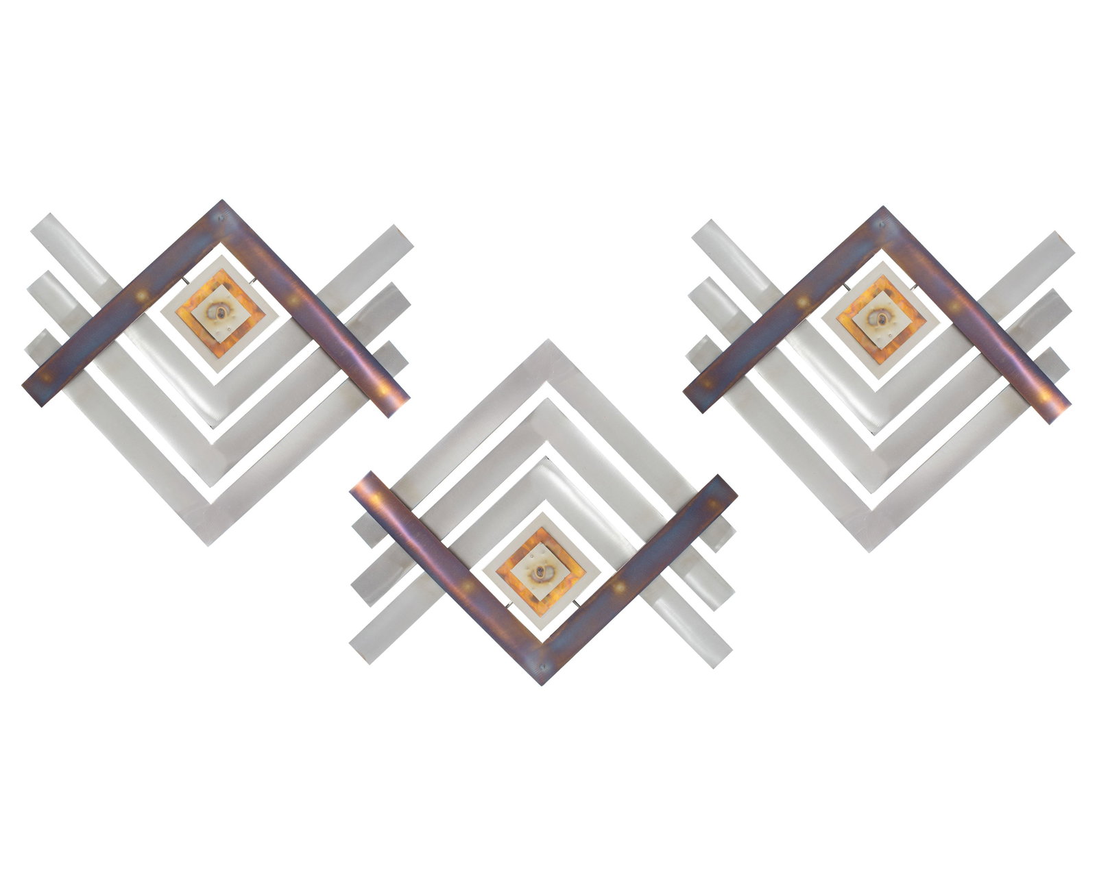 Modern Mixed Metal Wall Sculptures: Set of three modern mixed metal wall sculptures. Measurements: 17.5" W x 18" H x 1.5" D (single sculpture, each measures the same). In house shipping available.