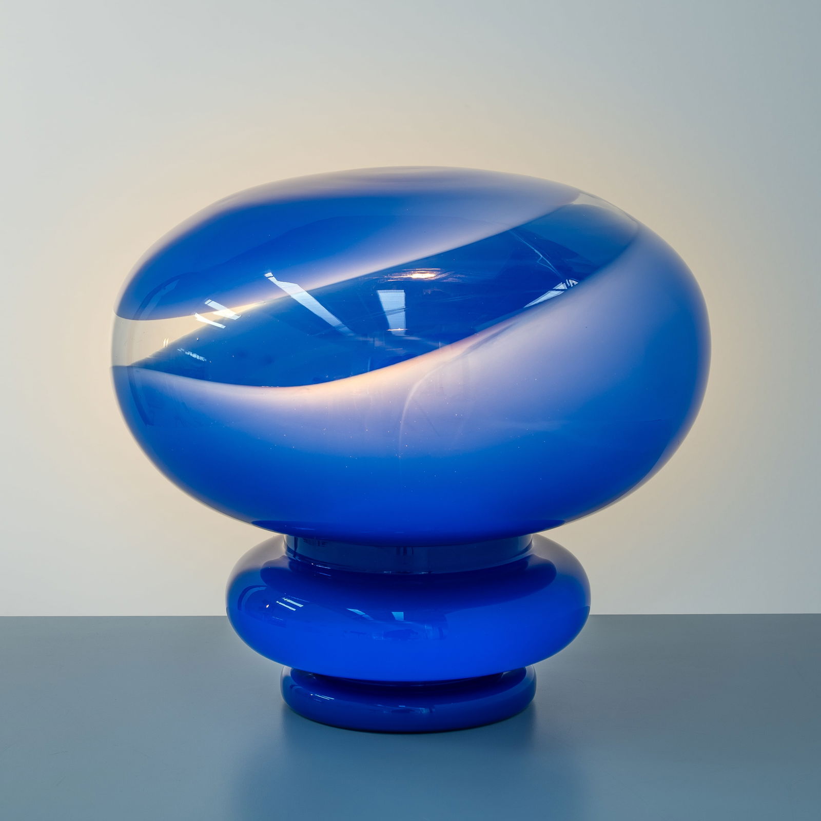 EZIO DIDONE, 'HIROSHIMA' TABLE LAMP: Blue 'incamiciato' glass decorated with transparent glass band, manufactured by La Murrina, Italy, 1960s, 39 x 42 cm diameter, Literature Domus n 481 December 1969 d/477; La Murrina sales catalogue 19