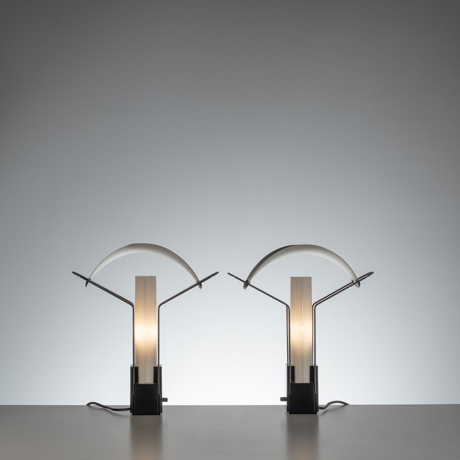PERRY KING AND SANTIAGO MIRANDA, PAIR OF 'PALIO' TABLE LAMPS: Opaline glass, painted steel and aluminium, produced by Arteluce, Italy, designed 1984, 40 x 32 x 17 cm, manufacturer's mark
