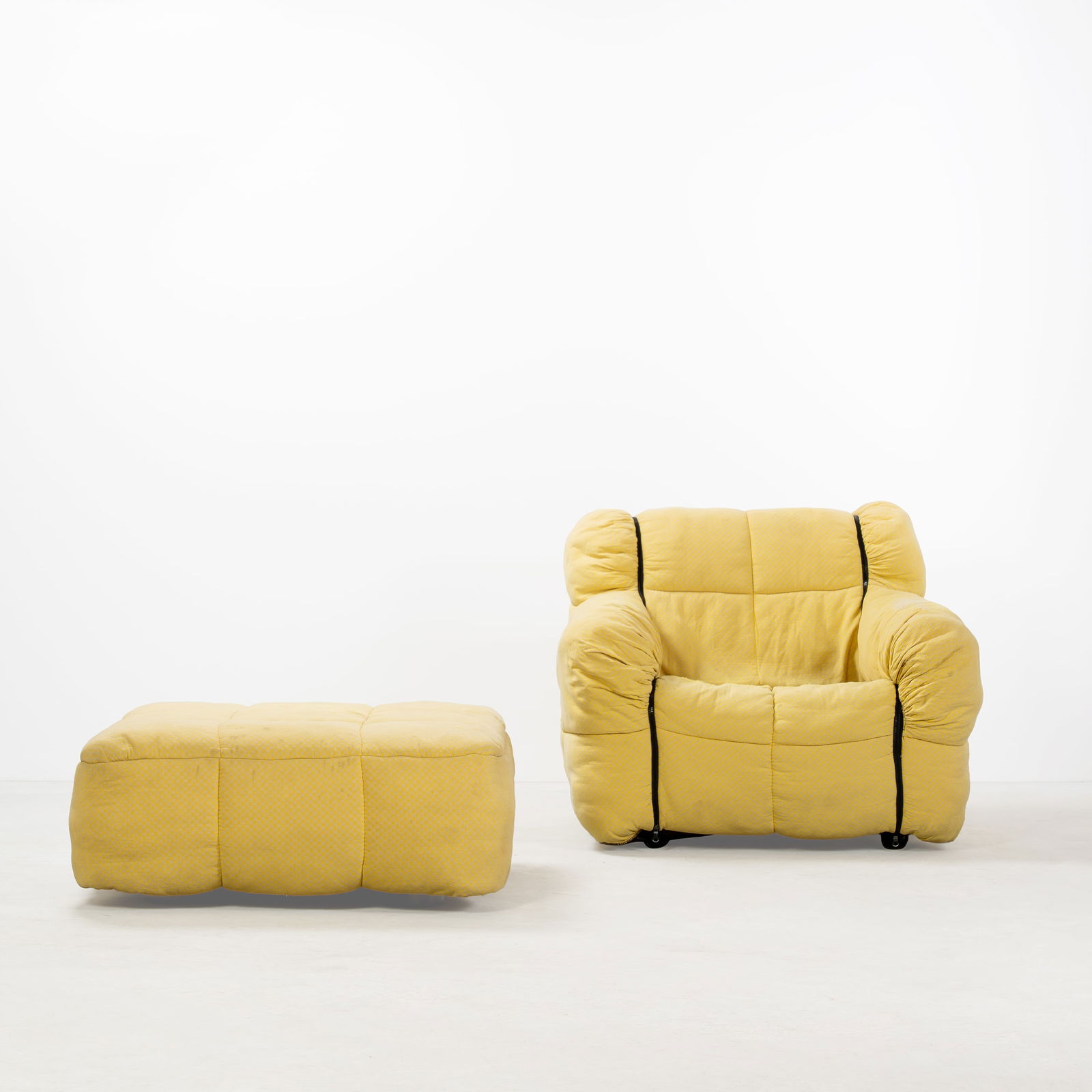 CINI BOERI, 'STRIP' ARMCHAIR AND OTTOMAN: Polyurethane, cotton fabric upholstery, produced by Arflex, Italy, 1980s, 83 x 93 x 86 cm, 33 x 86 x 86 cm, manufacturer's label, Literature Domus n 601 December 1979 Arflex advertisement n.p.