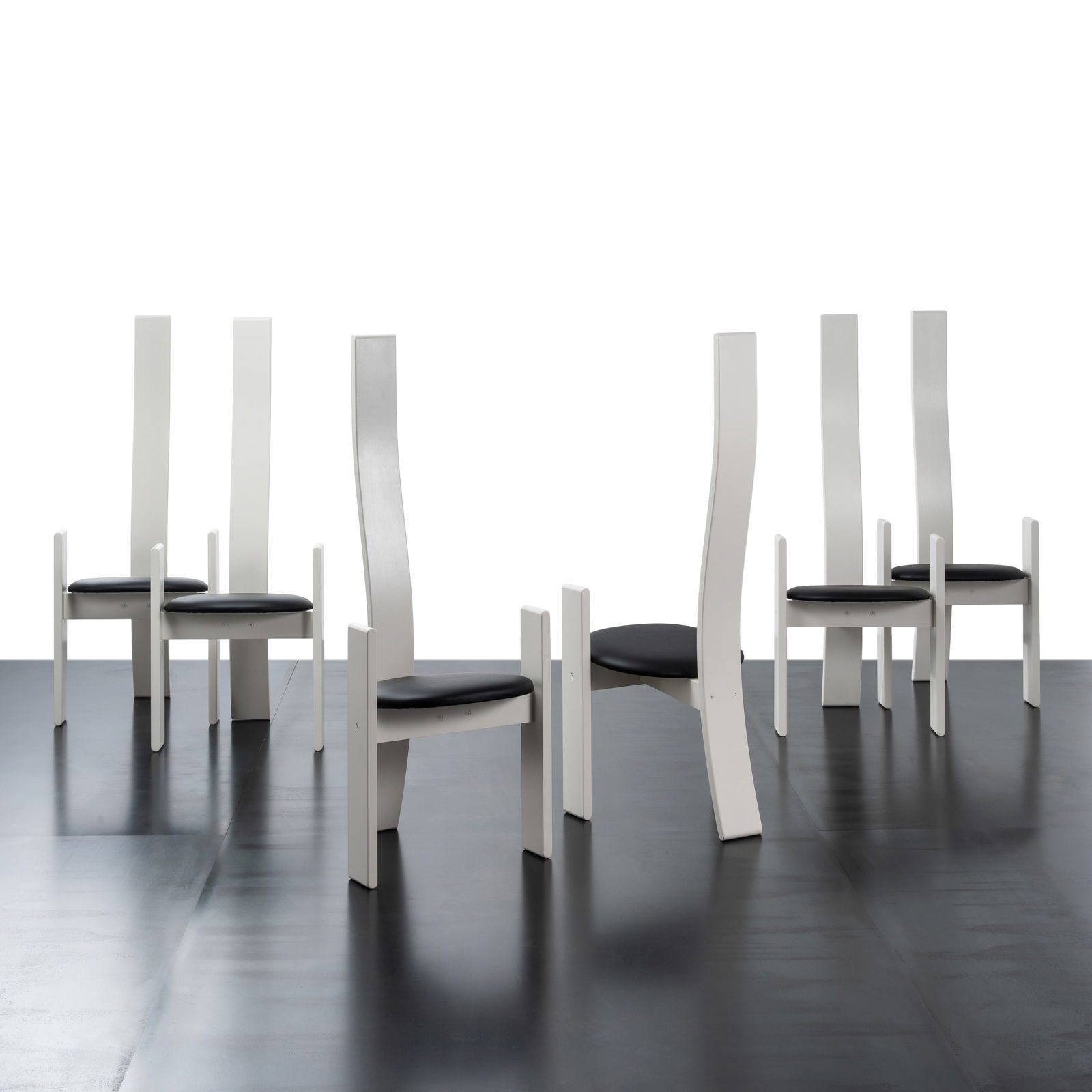 VICO MAGISTRETTI SET OF SIX GOLEM CHAIRS: Solid wood and leather upholstery Manufactured by Poggi Italy 1969 126 X 50 cm Bibliography G. Gramigna Il design in Italia dell'arredamento domestico : 473 progettisti degli ultimi cinquant'anni 1999