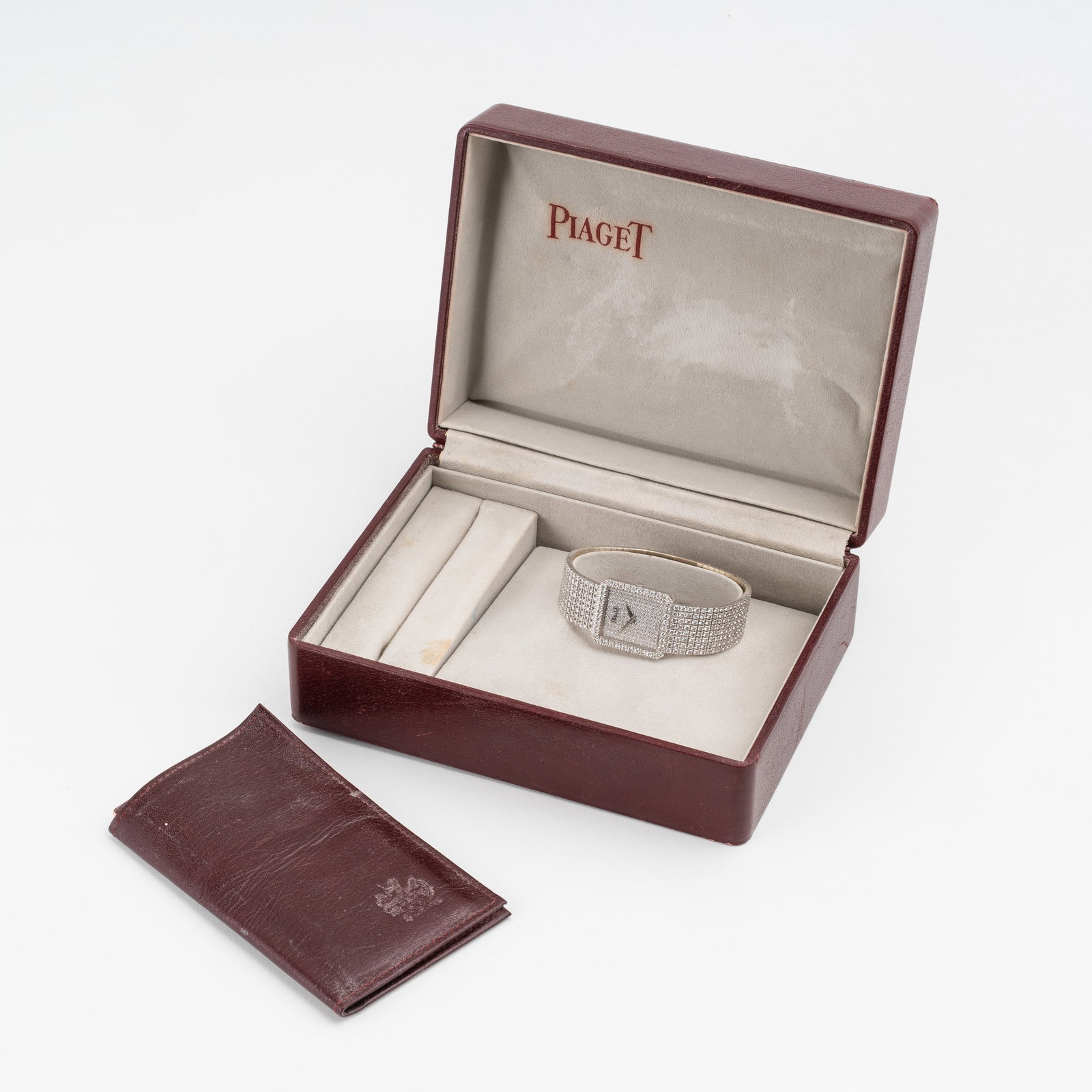 PIAGET - PROTOCOLE MANUAL-WINDING TIME-ONLY WATCH IN 18 KT WHITE GOLD WITH INTEGRATED 18 KT WHITE: Brand: Piaget Model: Protocole Year: Circa 2000 Reference: 91544 Dial: Diamond Case N: 388XXX Movement: Manual winding Caliber: Piaget Material: 18 kt white gold and diamonds Bracelet/Strap: 18 kt whi