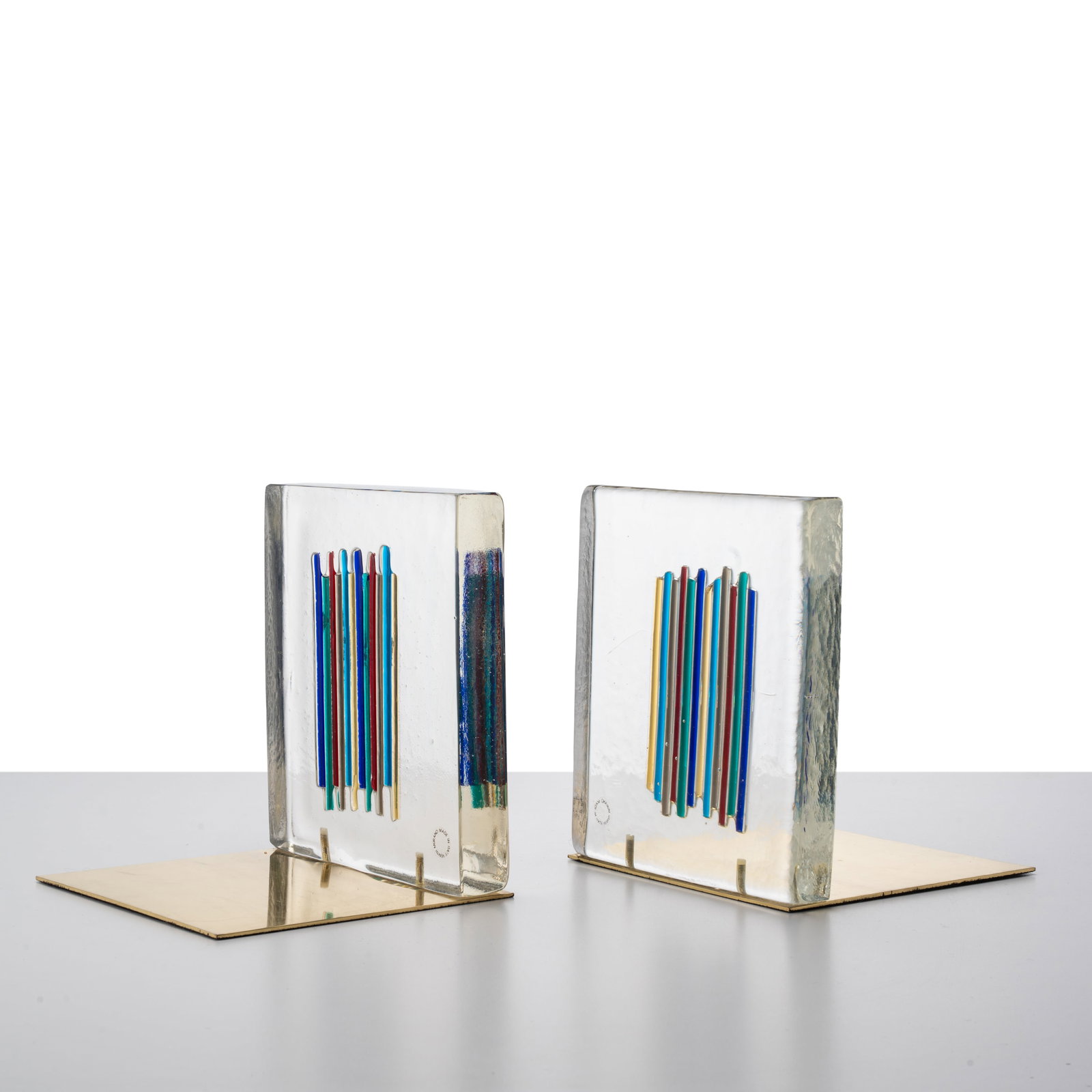 VENINI PAIR OF BOOKENDS: Polychrome glass and brass manufactured by Venini Italy 1960 20 x 18 x 17 cm manufacturer's label