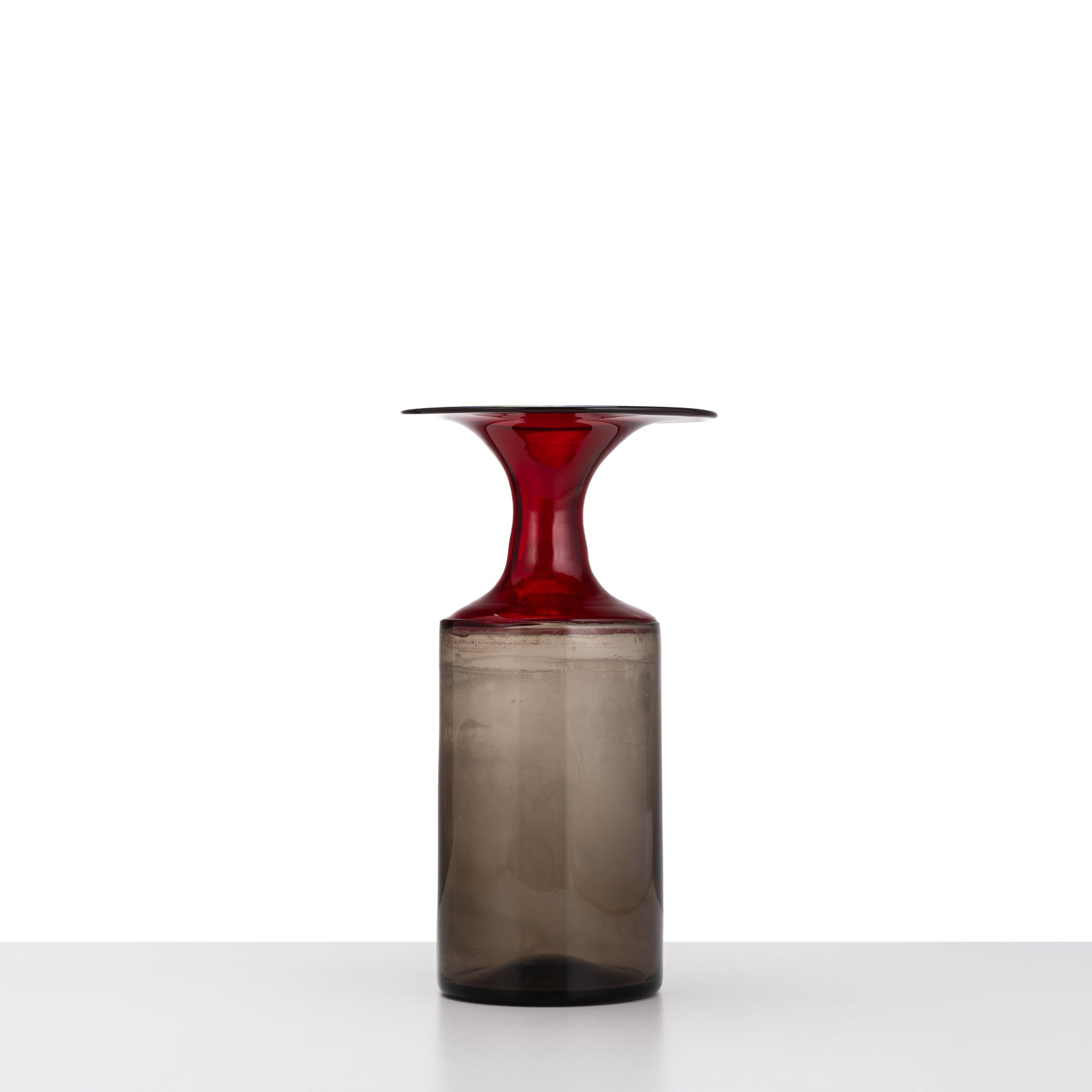 TAPIO WIRKKALA VASE FROM THE \“LAPPONI\?? SERIES: Smoked and red free-blown glass manufactured by Venini Italy 1966 13.5 x 13.5 cm pointed signature on the base: Venini Italia TW