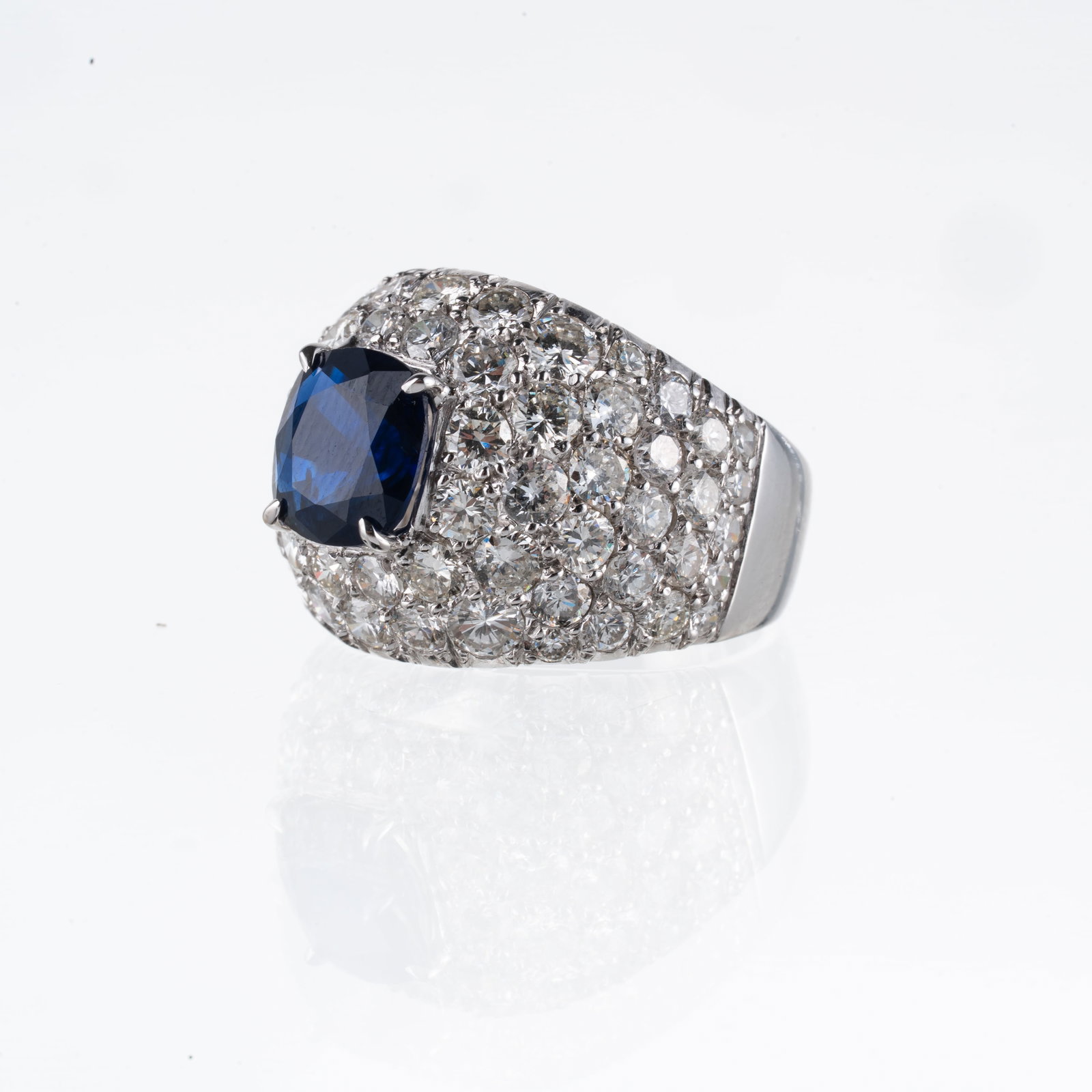 PLATINUM RING WITH A SAPPHIRE AND A BAND OF DIAMONDS (1 of 3)