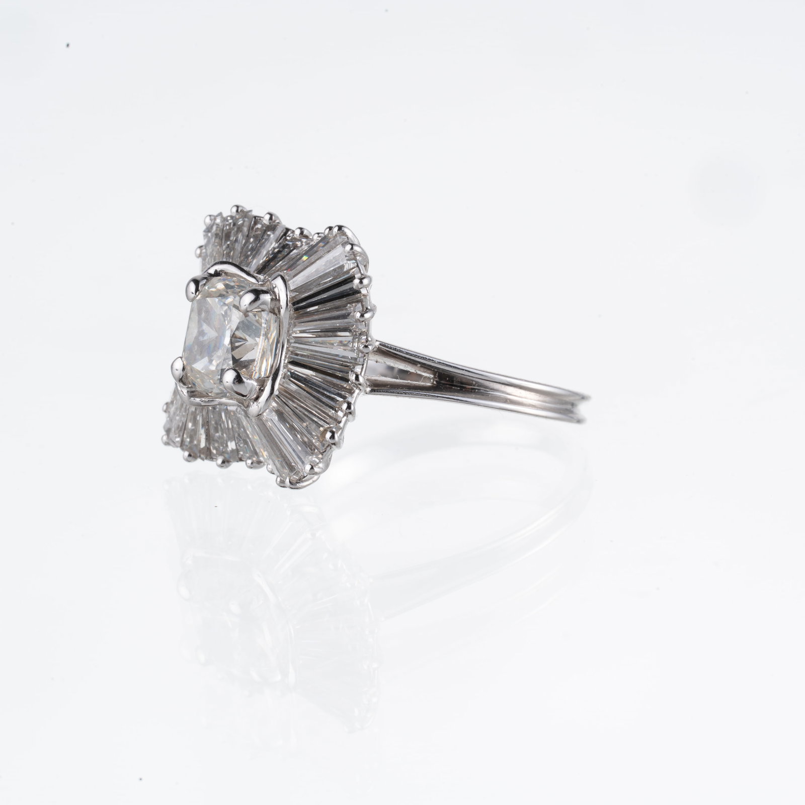 18-KT WHITE GOLD RING WITH A 1.70 CT CUSHION-CUT DIAMOND AND A BAND SET WITH TAPER-CUT DIAMONDS (1 of 4)