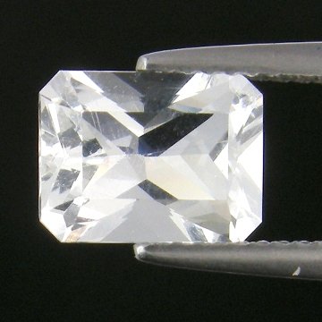 1.99cts~Wow Pure White Diamond Like Pollucite: STONE NAME : POLLUCITE , LOT NO : PL001 - 36 (187) , Quantity: 1PCS , WEIGHT CTS : 1.99 CTS , SIZE : 8.7 X 6.6 X 4.9 MM . COLOR : WHITE , SHAPE : OCTAGON , CLARITY : IF , ORIGIN : AFGHANISTAN , LUSTER