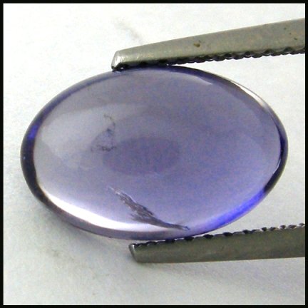 3.06cts~ Natural Rich Tanzanite blue Iolite: STONE NAME : IOLITE , LOT NO : IL 56 - 6 (314) , Quantity: 1PCS , WEIGHT CTS : 3.06CTS , SIZE : 11.7 X 7.7 X5.1MM COLOR : BLUE , SHAPE : OVAL , CLARITY : IF , ORIGIN : india , LUSTER : MARVELOUS ,