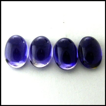 5.57cts~ Natural Rich Tanzanite blue Iolite: STONE NAME : IOLITE , LOT NO : IL 11 - 7 (377) , Quantity: 4PCS , WEIGHT CTS : 5.57CTS , SIZE : 9 X 6 X 3.1 MM COLOR : PURPLE BLUE , CLARITY : IF , SHAPE : OVAL , ORIGIN : India , LUSTER : MARVELOUS ,