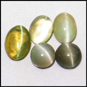 5.47cts~Natural sharp eye Chrysoberyl Cats eye: STONE NAME : CAT'S EYE , LOT NO : CE 446E - 6 (1031) , Quantity: 5PCS , WEIGHT CTS : 5.47 CTS , SIZE : MIX, COLOR : CHANGE , SHAPE : OVAL , CLARITY : IF - VVS , ORIGIN : RUSSIA , LUSTER : MARVELOUS , 