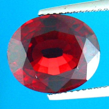 7.18CTS~Natural Red Spinel: STONE NAME : SPINEL , LOT NO : SP0188 - (2052) , Quantity: 1PCS , WEIGHT CTS : 7.18CTS , SIZE : 13.3 X 11.2 X 6.2 MM , COLOR : RED , SHAPE : OVAL , CLARITY : IF , ORIGIN : MYANMAR , LUSTER : MARVELOUS