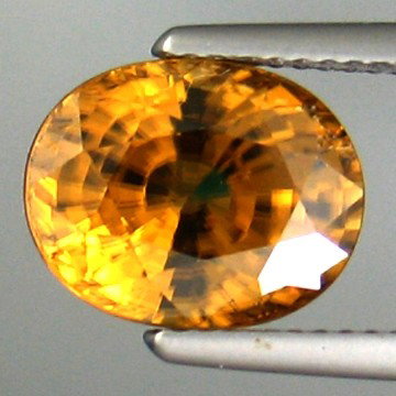 8.61cts~NATURAL YELLOW ZIRCON: STONE NAME : YELLOW ZIRCON , LOT NO : BZ0030 - (2090) , Quantity: 1PCS , WEIGHT CTS : 8.61 CTS , SIZE : 11 x 9 x 7.8 MM. COLOR : GREEN , CLARITY : IF , SHAPE : OVAL , ORIGIN : CAMBODIA , LUSTER : MARV