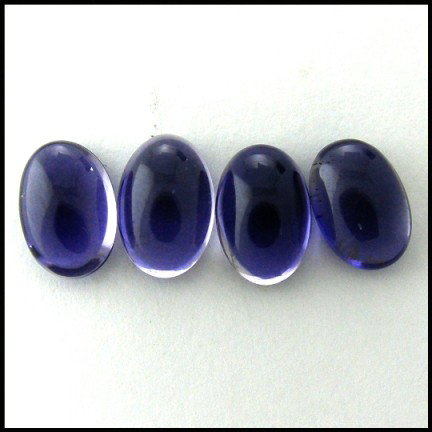 5.65cts~ Natural Rich blue Iolite: STONE NAME : IOLITE , LOT NO : IL 56 - 8 (346) , Quantity: 4PCS , WEIGHT CTS : 5.65CTS , SIZE : 8.8 X 6 X 4.1MM COLOR : BLUE , SHAPE : OVAL , CLARITY : IF , ORIGIN : India , LUSTER : MARVELOUS , HARDN