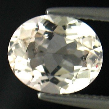 3.65cts~Wow Pure White Diamand Like Danburite: STONE NAME : DANBURITE , LOT NO : DA06 - 9 (1009) , Quantity: 1PCS , WEIGHT CTS : 3.65 CTS , SIZE : 10.3 x 8.6 x 5.4 MM . COLOR : WHITE , SHAPE : OVAL , CLARITY : VVS , ORIGIN : Afghanistan , LUSTER :