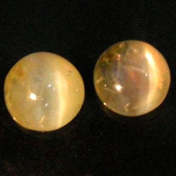 1.76Cts~Natural Chrysoberyl Cat's eye: STONE NAME : Chrysoberyl Cat's eye , LOT NO : CE496C- 1 (2920) , Quantity: 2PCS , WEIGHT CTS : 1.76CTS , SIZE : 4.9 X 3 MM. , COLOR : COLOR CHANGE , SHAPE : ROUND , CLARITY : VVS , ORIGIN : INDIA