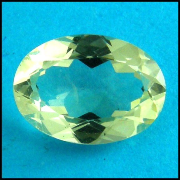 2.12CTS~Natural Labradorite: STONE NAME : LABRAODITE , LOT NO : LB10 - 42 (339) , Quantity: 1PCS , WEIGHT CTS : 2.12CTS , SIZE : 10.4 X 7.5 X 4.3 MM , COLOR : YELLOW , SHAPE : OVAL , CLARITY : VVS , ORIGIN : CONGO , LUSTER : MARV