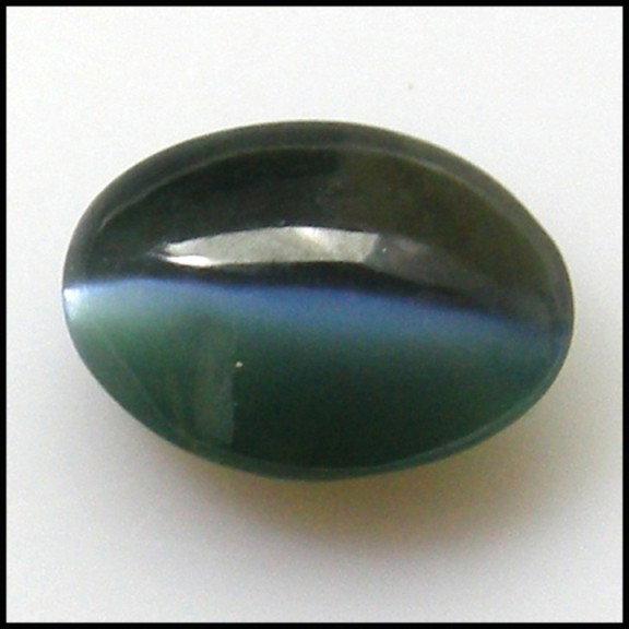 0.92Cts~NATURAL Color change ALEXANDRITE CAT'S EY: STONE NAME : ALEXANRITE CAT'S EYE , LOT NO : ACE 236 - 22 (1257) , Quantity: 1PCS , WEIGHT CTS : 0.92 CTS , SIZE : 7 X 5 X 3 MM , COLOR : CHANGE , SHAPE : OVAL , CLARITY : VVS , ORIGIN : RUSSIA , LUST