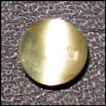 0.98cts~Natural sharp eye Chrysoberyl Cats eye: STONE NAME : Chrysoberyl Cat's eye , LOT NO : CE496C- 7 (1771) , Quantity: 1PCS , WEIGHT CTS : 0.98CTS , SIZE : 5.3 X 5.1 X 3.3 MM , COLOR : COLOR CHANGE , SHAPE : OVAL , CLARITY : VVS , ORIGIN : INDI