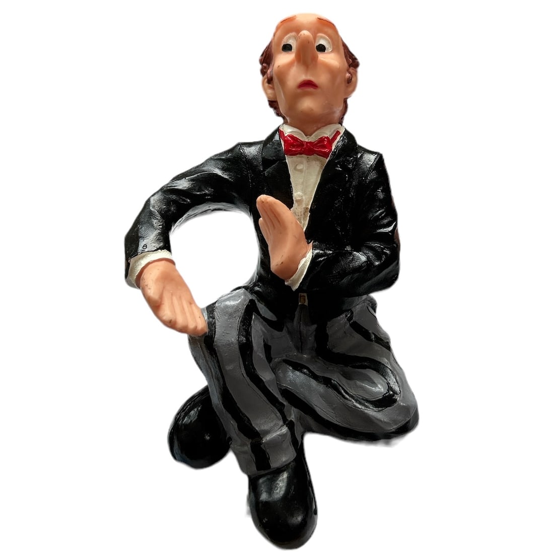 90s Ganz James the Butler Sommelier with Red Bowtie Wine Holder Resin Figurine: Add a touch of sophistication to your wine collection with this exquisite Ganz Waiter Sommelier figurine. Crafted from high-quality ceramic and resin, this handmade figurine features a charming red bo