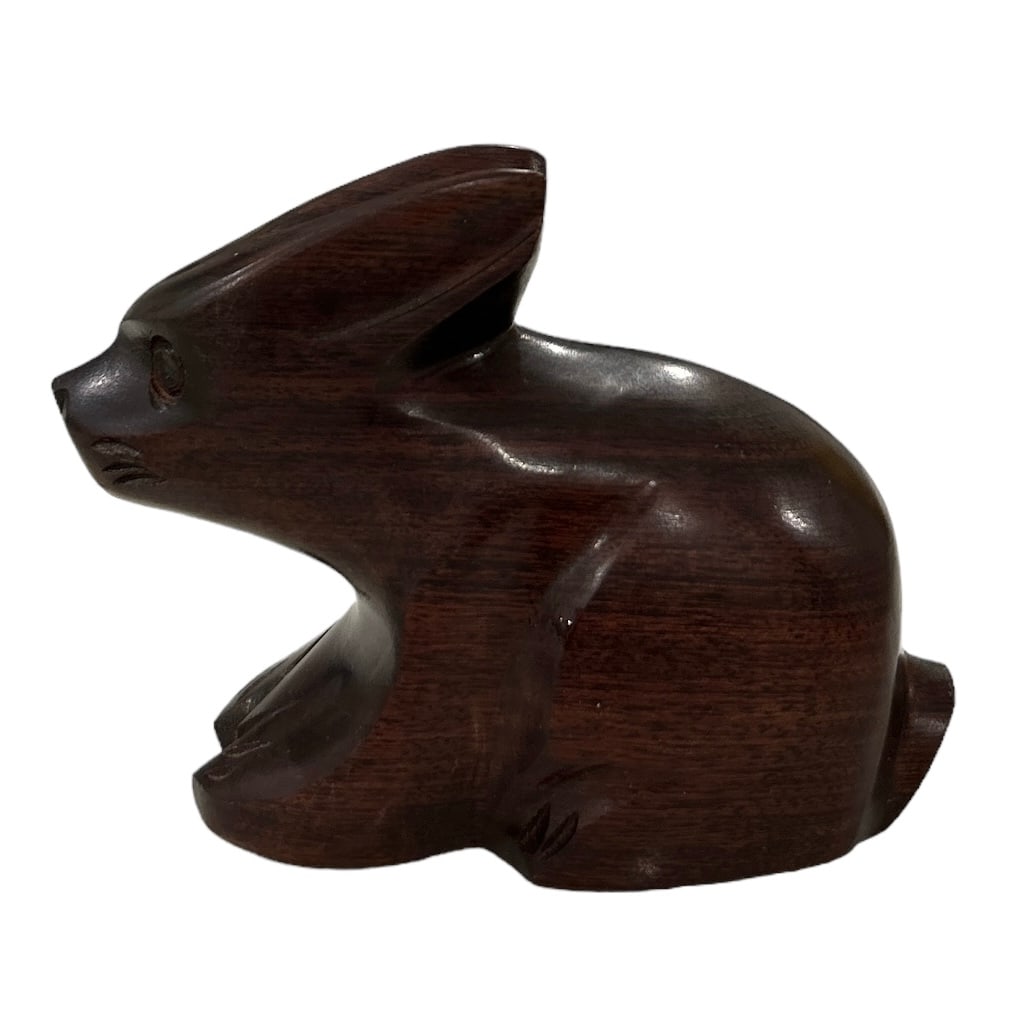 Dark Brown Stained Iron Wood Carved Rabbit Figurine: Add a touch of vintage charm to your home decor with this beautifully crafted dark brown stained iron wood rabbit figurine. The handmade carvings and wood grain pattern make this piece a unique additi