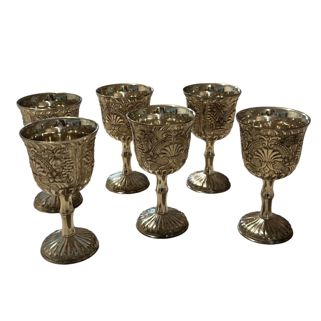 Vintage Set of 6 Raimond Silver Plate Liqueur or Wine Goblets with Grape Pattern: Add an elegant touch to your home bar with this set of six vintage Raimond silverplate goblets. The intricate Baroque and Rococo style design features a beautiful pattern of grapes, making them perfec