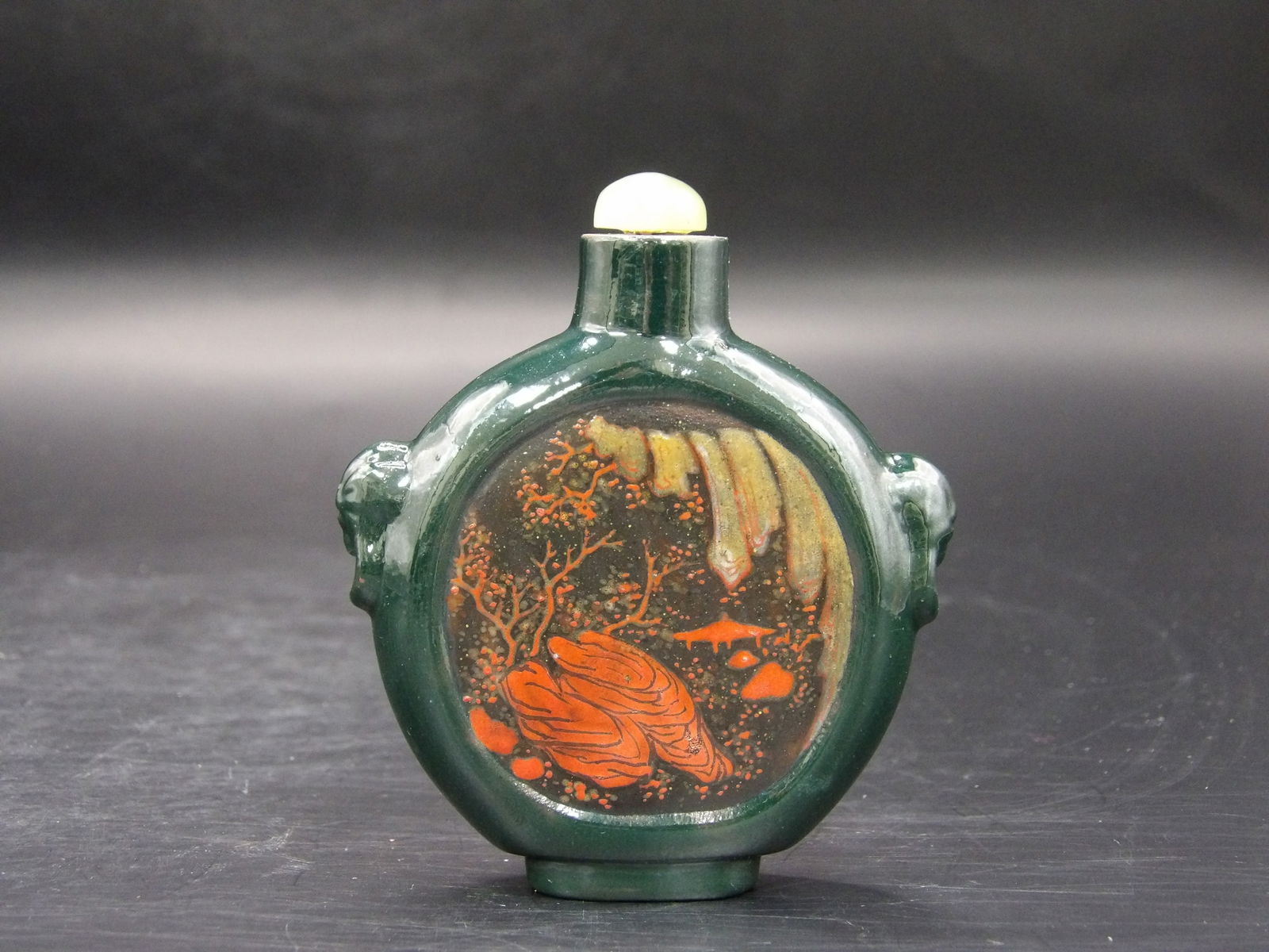 Chinese Yixing Purple Clay Enamel Painted Snuff Bottle: With mask handles. 2.8 inches height.