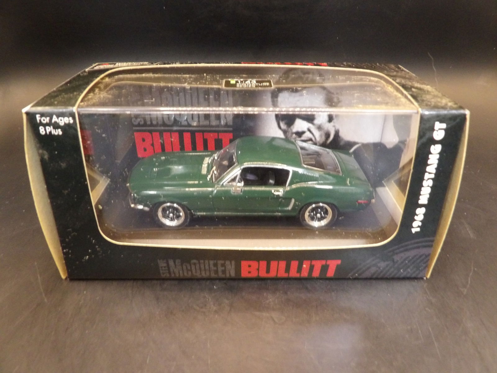 1968 Ford Mustang GT Bullitt: 4.5 inches length. Steve McQueen Bullitt Signature Series. In a display case.