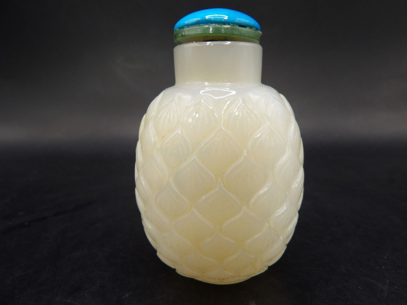 Chinese well hollowed jade snuff bottle with lotus carving: 2.4 inches height.